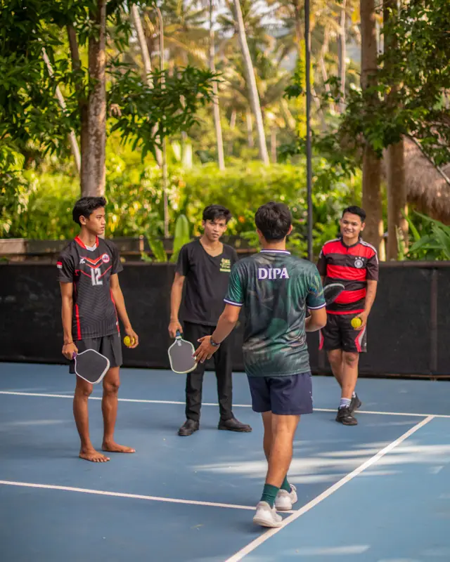 Players gathered for coaching on court